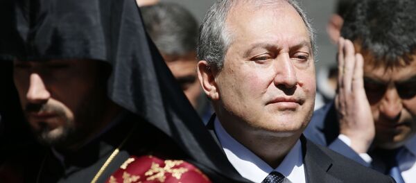 Armenian President Armen Sarkissian attends a wreath laying ceremony to commemorate the 103rd anniversary of mass killing of Armenians by Ottoman Turks, at the Tsitsernakaberd Memorial Complex in Yerevan, Armenia April 24, 2018 - Sputnik International