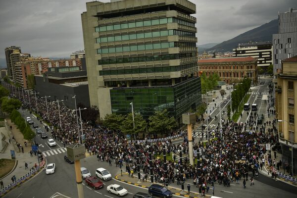 Some thousands of people march along an avenue during a protest against sexual abuse in Pamplona, northern Spain, Saturday, April 28, 2018 Some thousands of people march along an avenue during a protest against sexual abuse in Pamplona, northern Spain, Saturday, April 28, 2018 - Sputnik International