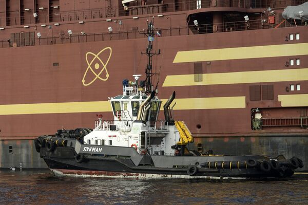 The Akademik Lomonosov floating nuclear power plant is towed from the Baltic Shipyard in St. Petersburg The Akademik Lomonosov floating nuclear power plant is towed from the Baltic Shipyard in St. Petersburg - Sputnik International