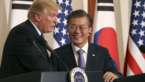 President Donald Trump, left, speaks as South Korean President Moon Jae-in looks on during a joint news conference at the Blue House in Seoul, South Korea, Tuesday, Nov. 7, 2017 - Sputnik International