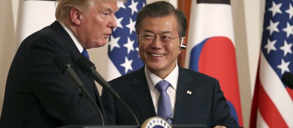 President Donald Trump, left, speaks as South Korean President Moon Jae-in looks on during a joint news conference at the Blue House in Seoul, South Korea, Tuesday, Nov. 7, 2017 - Sputnik International