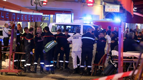 Police and firefighters stand at the scene of an incident in a street of Nice late April 30, 2018 - Sputnik International