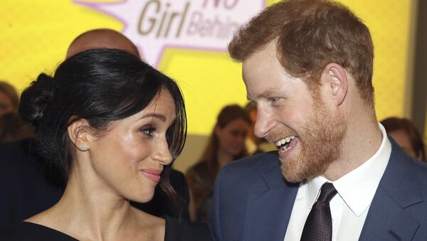 Britain's Prince Harry, left and Meghan Markle attend a women's empowerment reception at the Royal Aeronautical Society, during the Commonwealth Heads of Government Meeting, in London, Thursday April 19, 2018. - Sputnik International