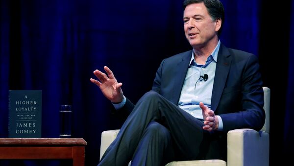 Former FBI director James Comey speaks about his book during an onstage interview with Axios Executive Editor Mike Allen at George Washington University in Washington, U.S. April 30, 2018 - Sputnik International