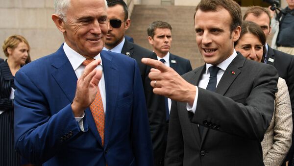French President Emmanuel Macron (R) gestures as he stands next to Australian Prime Minister Malcolm Turnbull after a Commemorative Service at the Anzac war memorial in Sydney, May 2, 2018 - Sputnik International