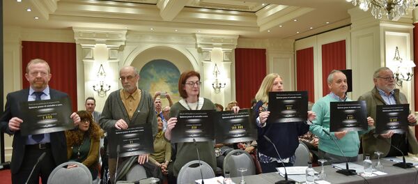 Consuelo Ordonez (3rdR), sister of Spanish Popular Party (PP) councilor Gregorio Ordonez killed by ETA, Maite Pagazaurtundua (C), sister of assassinated Joseba Pagazaurtundua, South East Fermanagh Foundation (SEFF) director Kenny Donaldson (L) hold placards during a press conference by the Association of the Victims of Terrorism of Basque Country (Covite) in the Spanish Basque city of San Sebastian on May 2, 2018. ETA is expected to announce its dissolution this weekend in a historic declaration Consuelo Ordonez (3rdR), sister of Spanish Popular Party (PP) councilor Gregorio Ordonez killed by ETA, Maite Pagazaurtundua (C), sister of assassinated Joseba Pagazaurtundua, South East Fermanagh Foundation (SEFF) director Kenny Donaldson (L) hold placards during a press conference by the Association of the Victims of Terrorism of Basque Country (Covite) in the Spanish Basque city of San Sebastian on May 2, 2018. ETA is expected to announce its dissolution this weekend in a historic declaration - Sputnik International