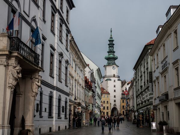 The street leading to Michael’s Gate in Bratislava, Slovakia is a medieval city gate that has been preserved and it ranks among the oldest town buildings. At the top of the tower is a statue of the archangel Michael, slaying a dragon. - Sputnik International