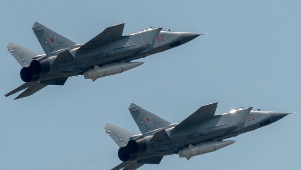 MiG-31s fitted with Kinzhals rehearsing for the Victory Day Parade outside Moscow. - Sputnik International