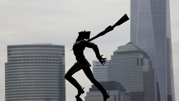 Buildings in Lower Manhattan provide a backdrop to a statue dedicated to the victims of the Katyn massacre of 1940, Friday, May 4, 2018, in Jersey City, N.J. - Sputnik International
