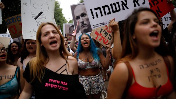 Israelis participate in the annual Slut Walk protest against sexual violence and crimes in Tel Aviv, Israel, May 4, 2018 - Sputnik International