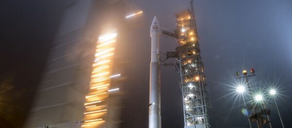 In this photo released by NASA, the mobile service tower at SLC-3 is rolled back to reveal the United Launch Alliance (ULA) Atlas-V rocket with NASA's InSight spacecraft onboard, Friday, May 4, 2018, at Vandenberg Air Force Base in Calif. - Sputnik International