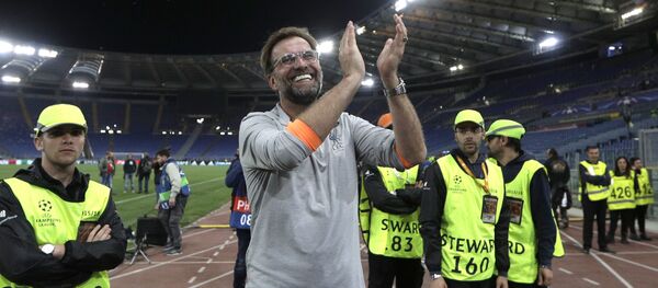 Liverpool coach Jurgen Klopp celebrates with the supporters at the end of the Champions League semifinal second leg soccer match between Roma and Liverpool at the Olympic Stadium in Rome, Wednesday, May 2, 2018 - Sputnik International