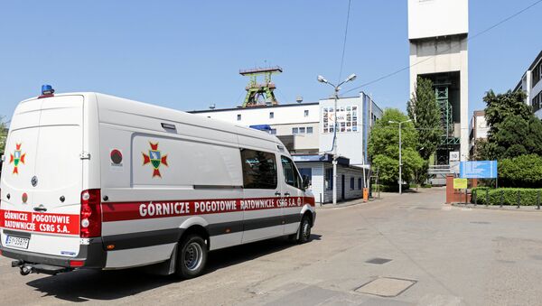 Emergency vehicle parks outside the JSW mine where coal miners are missing underground after a strong quake hit a mine in Jastrzebie Zdroj, Poland May 5, 2018 - Sputnik International