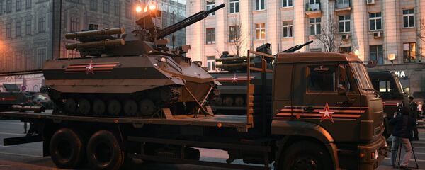 Uran-9 on its carrier at the rehearsal of the 2018 Victory Day parade Uran-9 on its carrier at the rehearsal of the 2018 Victory Day parade - Sputnik International