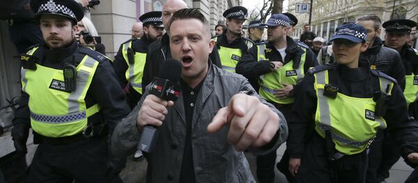 (File) Stephen Christopher Yaxley-Lennon, AKA Tommy Robinson, former leader of the right-wing EDL (English Defence League) is escorted away by police from a Britain First march and an English Defence League march in central London on April 4, 2017 (File) Stephen Christopher Yaxley-Lennon, AKA Tommy Robinson, former leader of the right-wing EDL (English Defence League) is escorted away by police from a Britain First march and an English Defence League march in central London on April 4, 2017 - Sputnik International