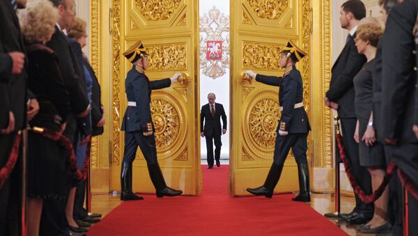 President-elect Vladimir Putin, center, enters St Andrew Hall of the Grand Kremlin Palace during the inauguration ceremony. File photo - Sputnik International