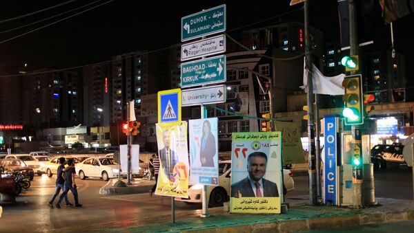 Campaign posters of a candidate are seen ahead of parliamentary election, in Erbil, Iraq, April 26, 2018 - Sputnik International