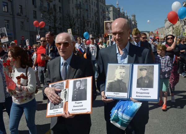Participants of the action An immortal regiment in Moscow Participants of the action An immortal regiment in Moscow - Sputnik International