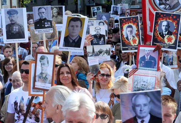 Participants of the action An immortal regiment in Minsk Participants of the action An immortal regiment in Minsk - Sputnik International