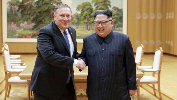 North Korean leader Kim Jong Un shakes hands with U.S. Secretary of State Mike Pompeo in this undated photo released on May 9, 2018 by North Korea's Korean Central News Agency (KCNA) in Pyongyang - Sputnik International