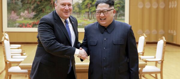 North Korean leader Kim Jong Un shakes hands with U.S. Secretary of State Mike Pompeo in this undated photo released on May 9, 2018 by North Korea's Korean Central News Agency (KCNA) in Pyongyang - Sputnik International