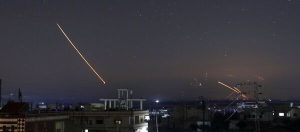 Missile fire is seen over Daraa, Syria May 10, 2018 - Sputnik International