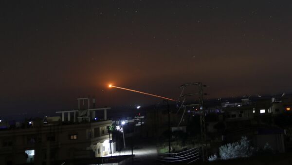 Missile fire is seen over Daraa, Syria May 10, 2018 - Sputnik International