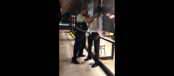 Video footage shared on Facebook shows 22-year-old Anthony Wall being slammed and choked by a North Carolina officer - Sputnik International