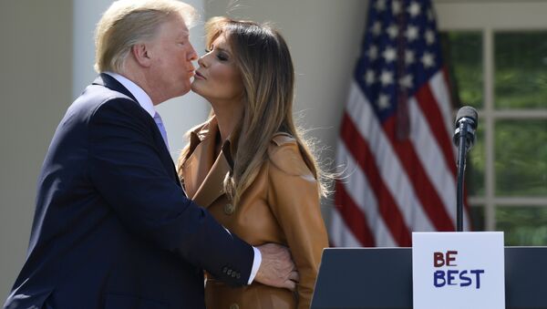 President Donald Trump kisses first lady Melania Trump following an event where Melania Trump announced her initiatives in the Rose Garden of the White House in Washington, Monday, May 7, 2018 - Sputnik International