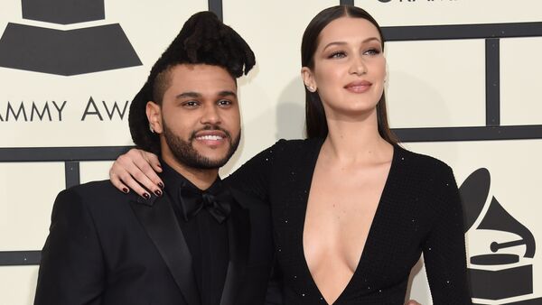 Bella Hadid and singer The Weeknd arrive on the red carpet for the 58th Annual Grammy music Awards in Los Angeles February 15, 2016 - Sputnik International