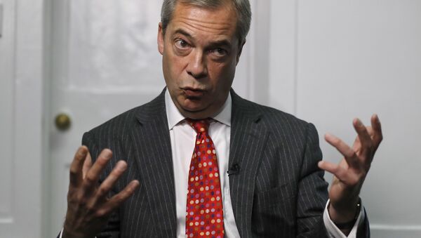 Former UK Independence Party (UKIP) leader Nigel Farage gestures during an interview with The Associated Press in London, Tuesday, Nov. 29, 2016. - Sputnik International