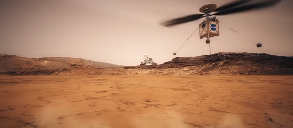 Still shot from a NASA animated video showing what their Mars Helicopter would look like in action. - Sputnik International