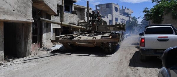 A T-55 tank in the area of the former Palestinian refugee camp Yarmouk in the southern suburb of Damascus A T-55 tank in the area of the former Palestinian refugee camp Yarmouk in the southern suburb of Damascus - Sputnik International