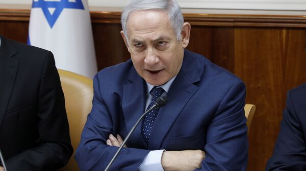 Israeli Prime Minister Benjamin Netanyahu chairs the weekly cabinet meeting at the Prime Minister's office in Jerusalem, Sunday, April 15, 2018 - Sputnik International