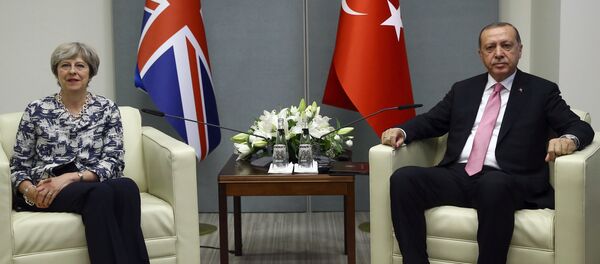Turkey's President Recep Tayyip Erdogan, right, and with British Prime Minister Theresa May pose for photos at U.N. headquarters, Tuesday, Sept. 19, 2017. Turkey's President Recep Tayyip Erdogan, right, and with British Prime Minister Theresa May pose for photos at U.N. headquarters, Tuesday, Sept. 19, 2017. - Sputnik International