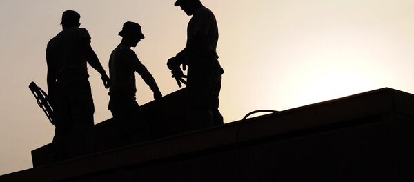 workers on a construction site workers on a construction site - Sputnik International