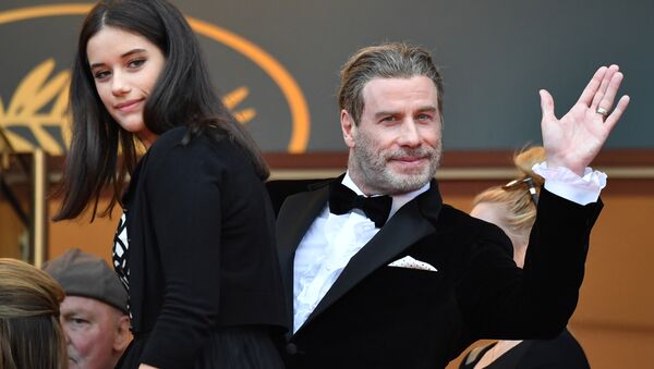 US actor John Travolta (R) and his daughter Ella Bleu Travolta arrive on May 15, 2018 for the screening of the film Solo : A Star Wars Story at the 71st edition of the Cannes Film Festival in Cannes, southern France - Sputnik International