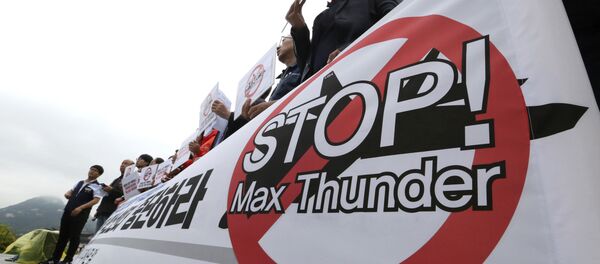 South Korean protesters stage a rally against the Max Thunder joint military exercise between the United States South Korea near the U.S. embassy in Seoul, South Korea, Wednesday, May 16, 2018. - Sputnik International