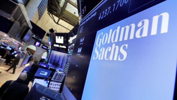 The logo for Goldman Sachs appears above a trading post on the floor of the New York Stock Exchange (File) - Sputnik International