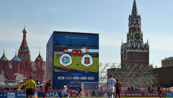 Players of the Spanish and German teams during a football match on Red Square marking 1000 days before 2018 World Cup in Russia. - Sputnik International