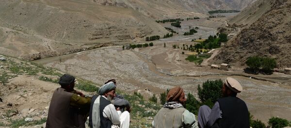 Afghan villagers sit on hilltop in the Guzargah-e-Nur district of Baghlan province (File) Afghan villagers sit on hilltop in the Guzargah-e-Nur district of Baghlan province (File) - Sputnik International