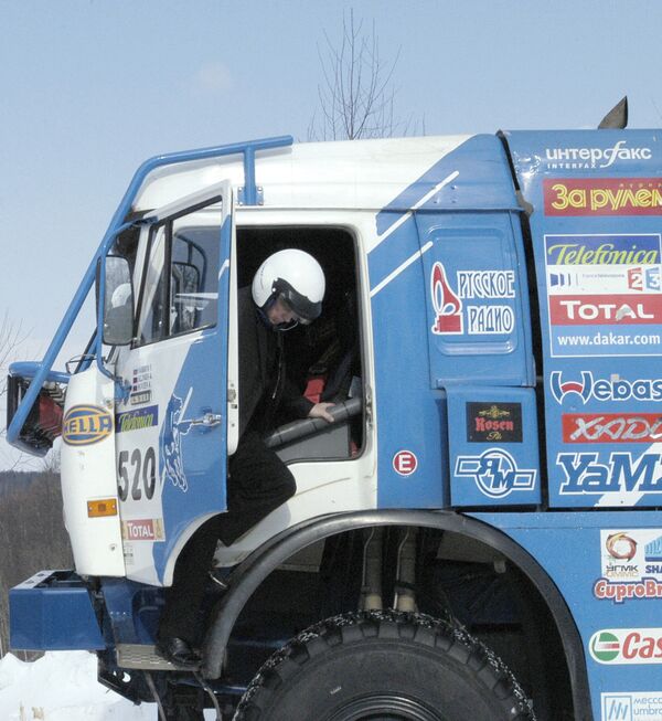 Russian President Vladimir Putin at the Central Automobile Proving Ground in Dmitrov, where he drove a KAMAZ for several hundred meters Russian President Vladimir Putin at the Central Automobile Proving Ground in Dmitrov, where he drove a KAMAZ for several hundred meters - Sputnik International