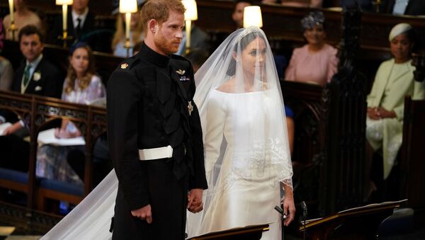 Prince Harry and Meghan Markle in St George's Chapel at Windsor Castle for their wedding in Windsor, Britain, May 19, 2018 - Sputnik International