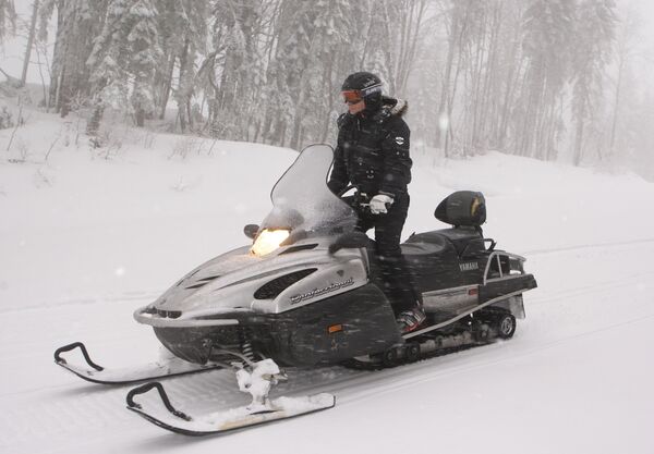 January 3, 2010. Russian Prime Minister Vladimir Putin riding a snowmobile at the alpine ski resort Krasnaya Polyana January 3, 2010. Russian Prime Minister Vladimir Putin riding a snowmobile at the alpine ski resort Krasnaya Polyana - Sputnik International