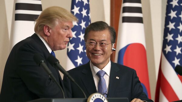 President Donald Trump, left, speaks as South Korean President Moon Jae-in looks on during a joint news conference at the Blue House in Seoul, South Korea, Tuesday, Nov. 7, 2017 - Sputnik International