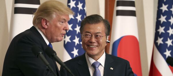 President Donald Trump, left, speaks as South Korean President Moon Jae-in looks on during a joint news conference at the Blue House in Seoul, South Korea, Tuesday, Nov. 7, 2017 - Sputnik International