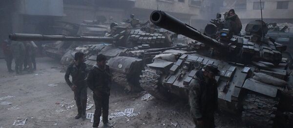The Syrian Army's tanks in the area of the former Palestinian refugee camp Yarmouk in the southern suburb of Damascus The Syrian Army's tanks in the area of the former Palestinian refugee camp Yarmouk in the southern suburb of Damascus - Sputnik International