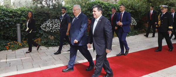 Paraguayan President Horacio Cartes walks next to Israeli President Reuven Rivlin upon his arrival for a meeting at the Israeli president's residence in Jerusalem, ahead of the dedication ceremony of the embassy of Paraguay in Jerusalem, May 21, 2018 - Sputnik International