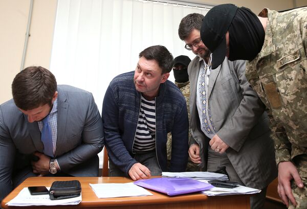 Journalist Kirill Vyshinsky, the director of Russian state news agency RIA Novosti Ukraine, attends a preliminary court hearing in Kherson, Ukraine May 17, 2018 Journalist Kirill Vyshinsky, the director of Russian state news agency RIA Novosti Ukraine, attends a preliminary court hearing in Kherson, Ukraine May 17, 2018 - Sputnik International