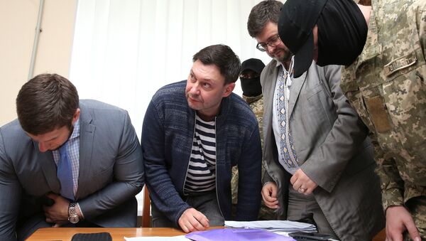 Journalist Kirill Vyshinsky, the director of Russian state news agency RIA Novosti Ukraine, attends a preliminary court hearing in Kherson, Ukraine May 17, 2018 - Sputnik International